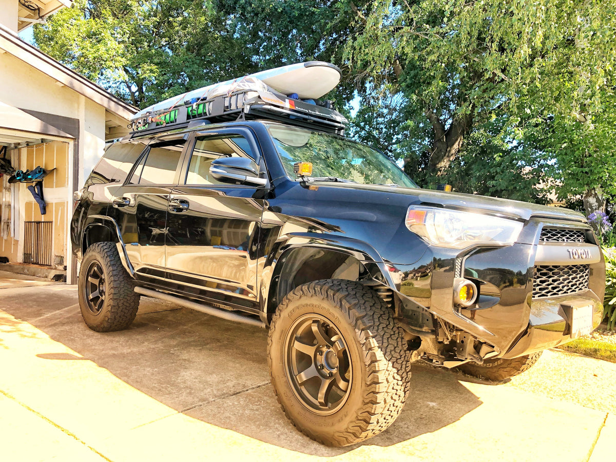 Front passenger side - Trail Edition Bolt On Rock Sliders on black 4Runner - Cali Raised LED
